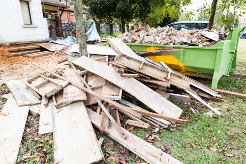 Professionals performing garden clearance in Manor Park